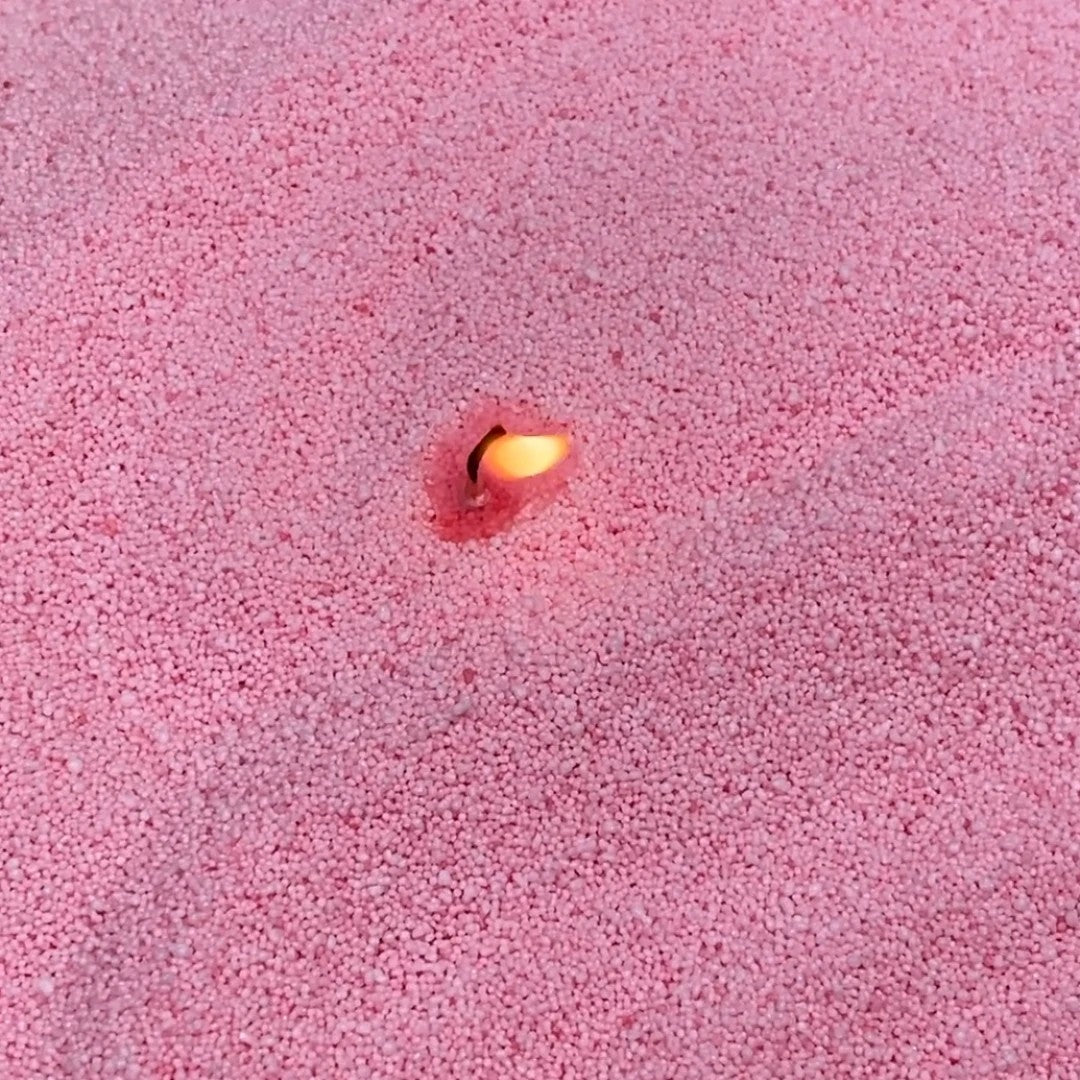 Close-up of vibrant Dark Baby Pink vegetable wax pearls texture 330g