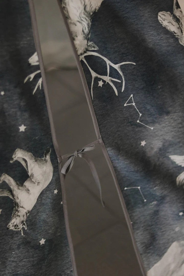 Nursery detail: close-up of the navy blue cotton tie-backs used to secure the entrance of the Night Sky star-patterned teepee tent
