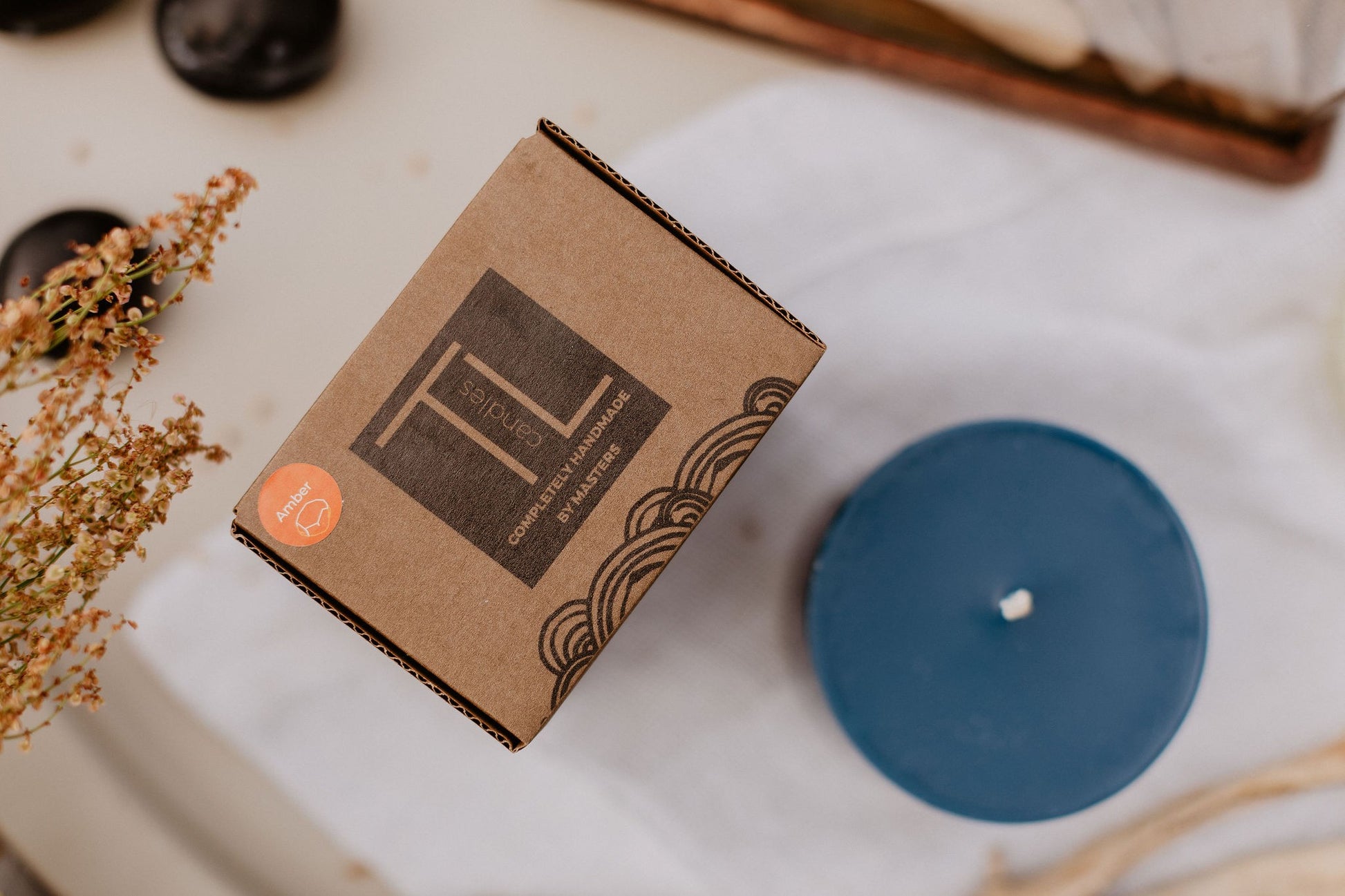 Eco-friendly gift packaging for TL Candles handmade amber soy wax candle