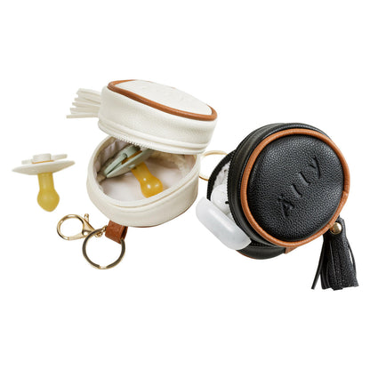 Interior of the white pacifier bag with space for two soothers