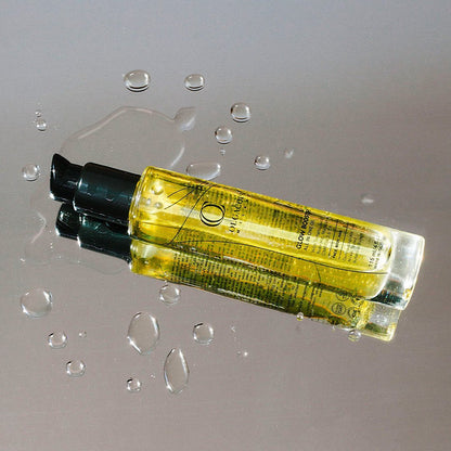 Luxurious bottle of Glow Booster Oil face and body treatment