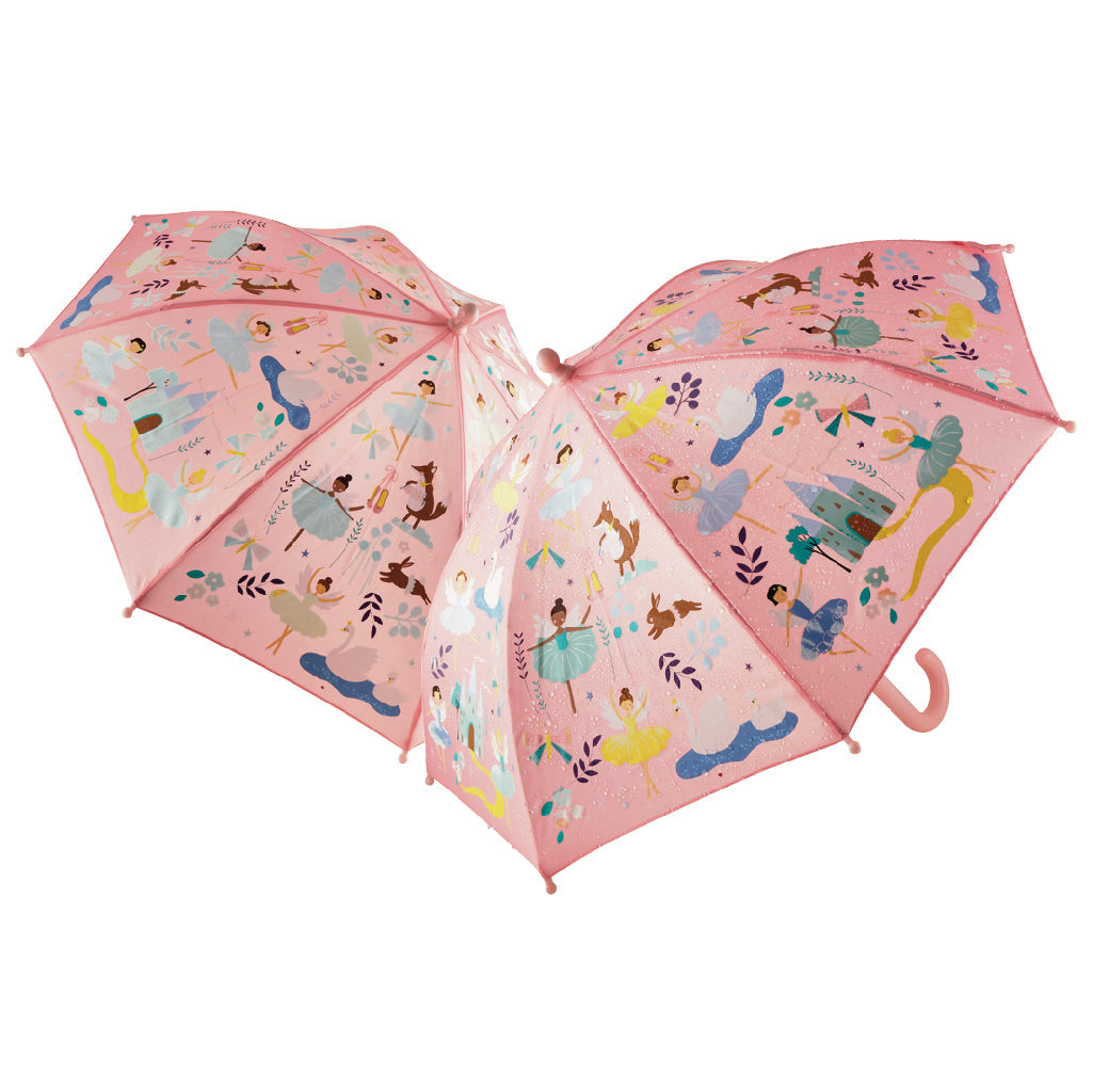 Floss and Rock Color Changing Umbrella - Enchanted, kids' color-changing umbrella that reveals bright patterns when wet, with a child-safe handle.