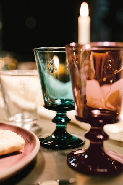 Close up of colorful La Rochere Bee Glasses 220ml on a festive dining table highlighting the 3D bee motif
