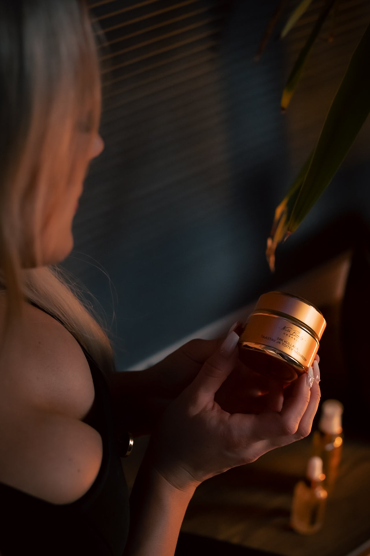 Luxury face moisturizer texture with real gold flakes for anti-aging