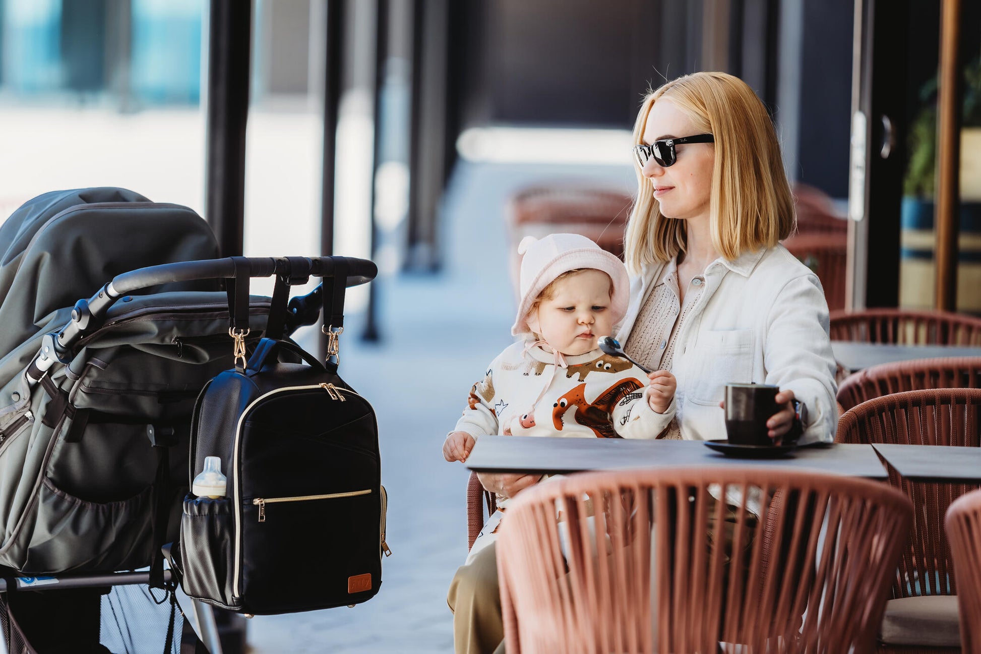 Small Espresso backpack on a chair in a bright stylish cafe