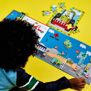 Top view Floss and Rock Magnetic Multiplay Scene - Construction Site, portable travel toy set with magnetic play pieces and multiple themed backgrounds.