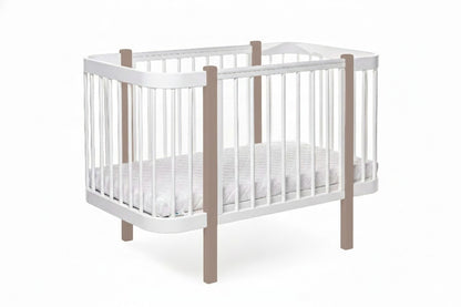 Front view of the two-tone cappuccino and white standard nursery cot