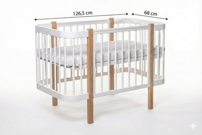 Measures of KOTTO Elin baby crib featuring a Scandinavian natural wood and white finish