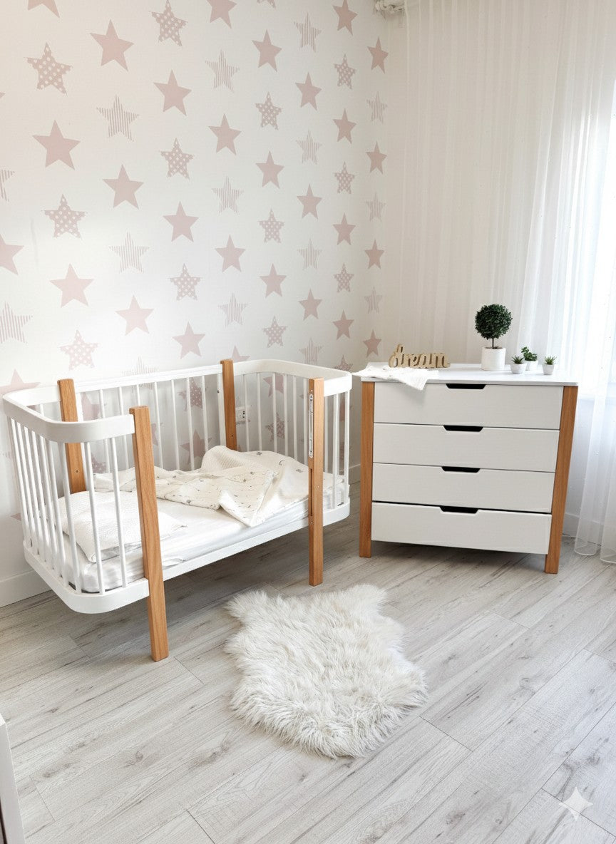 KOTTO Elin baby crib featuring a Scandinavian natural wood and white finish