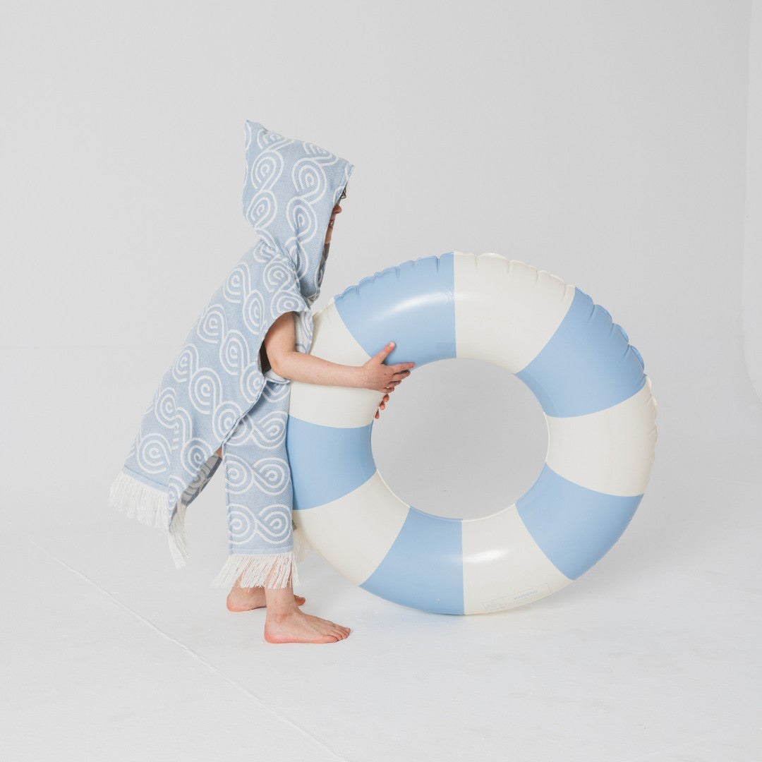 Lifestyle shot: baby wearing bamboo poncho after bath - Light Blue