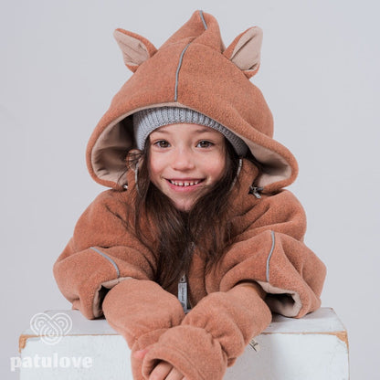 Close-up of cute animal ears on the hood - Fox