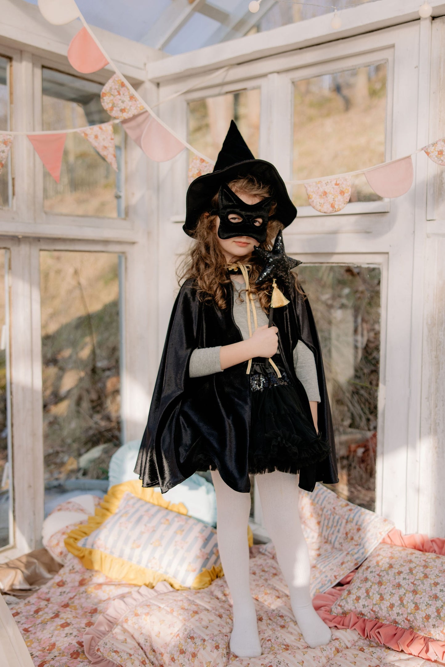 Lifestyle: Child wearing the Black sequined cat mask