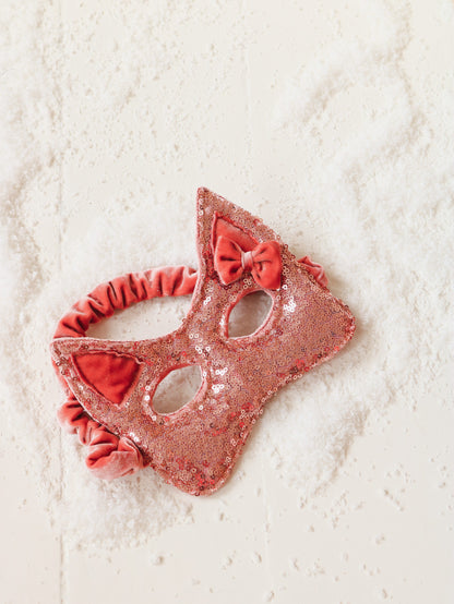 Close-up of the shimmering pink sequins and soft velour ears