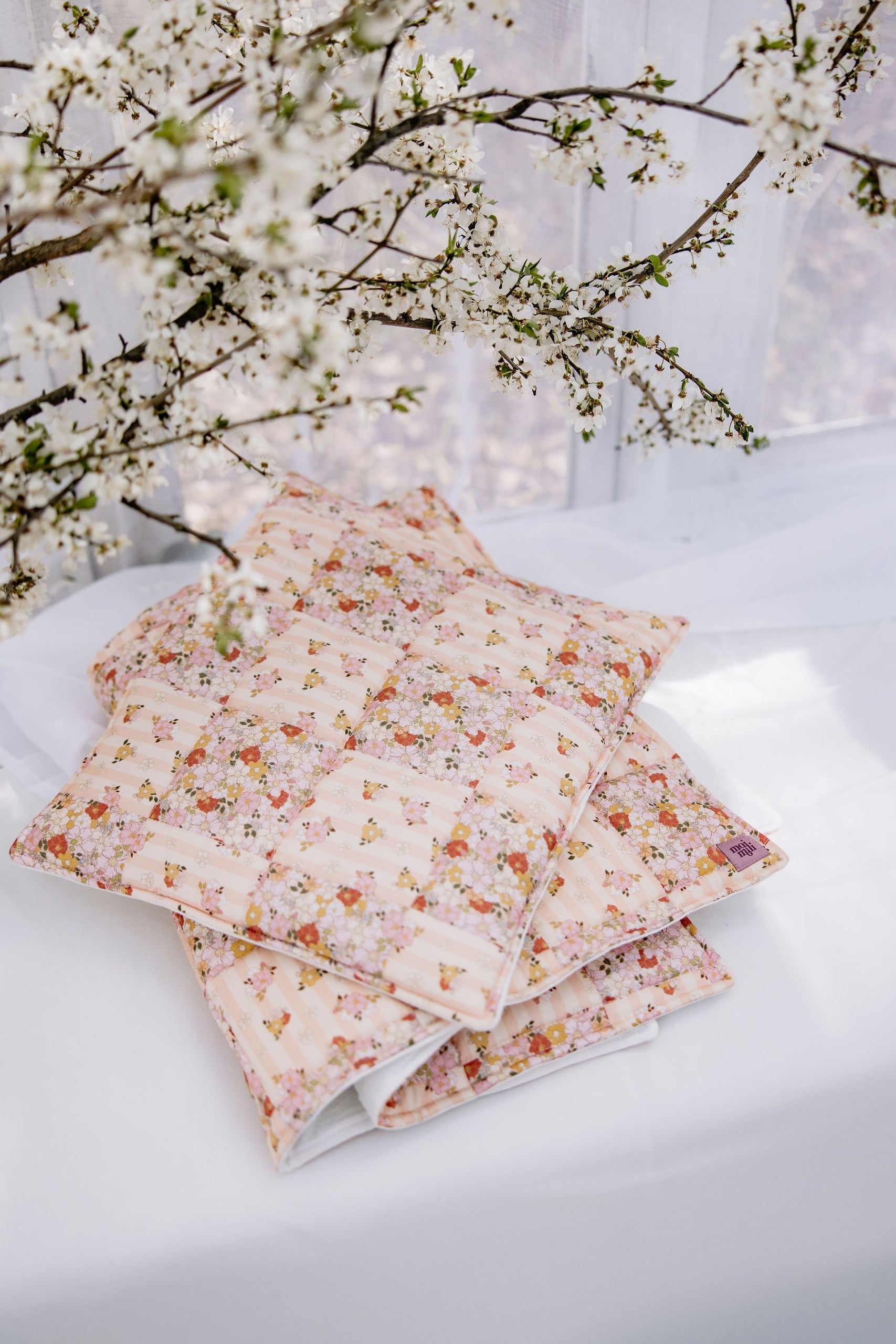 Spring Garden floral patchwork design detail with delicate pastel tones