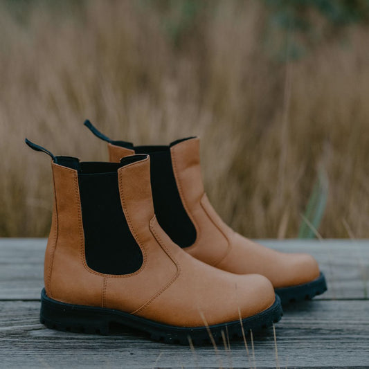 Side view of brown KIRA 3.0 Chelsea Boots crafted from sustainable vegan leather.