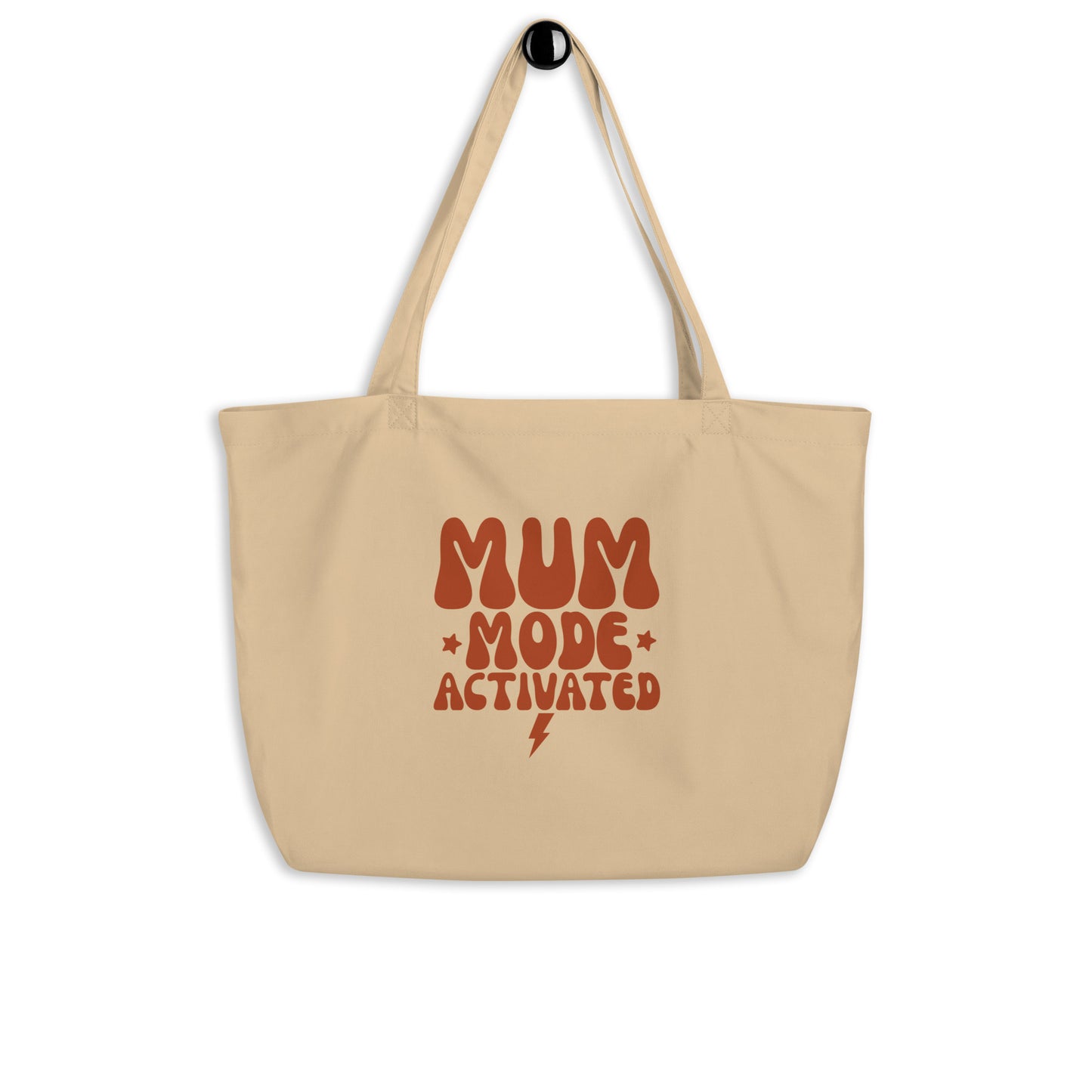 The certified organic  front view of the cotton tote bag hanging, displaying its structure 