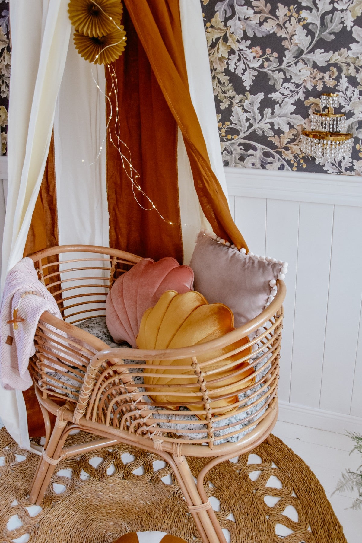 Nursery decor: Caramel Circus canopy creating a vintage tent over a wooden crib