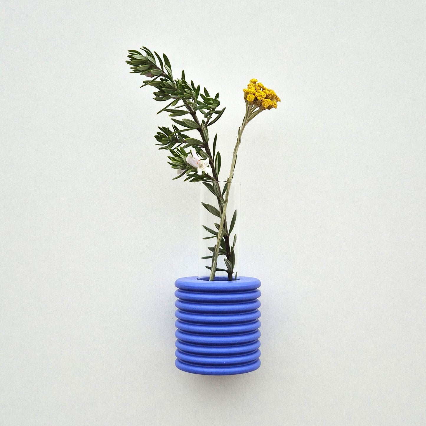 Modern Ribble wall-mounted ceramic vase in Blue handmade in Portugal. Space-saving vertical garden decor with Carbon-Neutral Shipping.