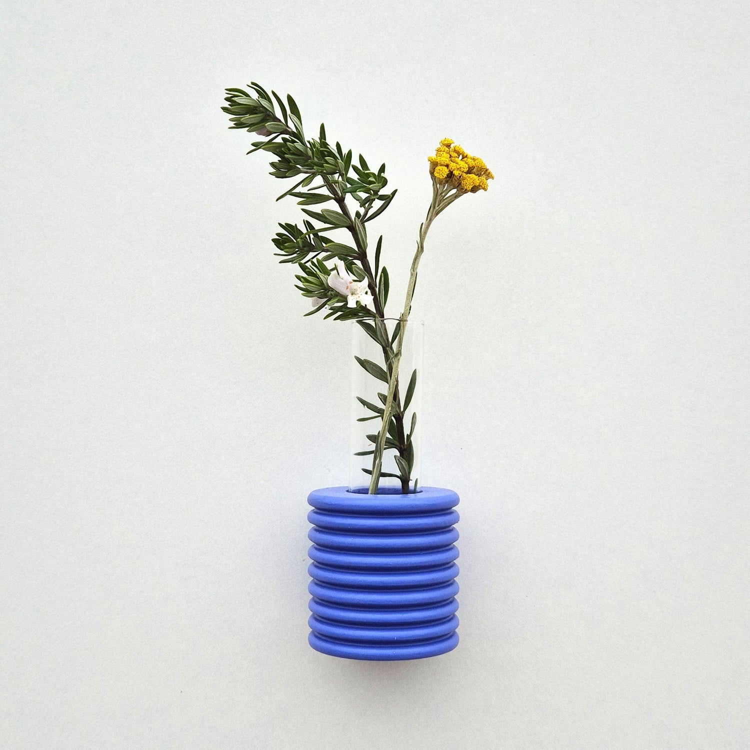 Modern Ribble wall-mounted ceramic vase in Blue handmade in Portugal. Space-saving vertical garden decor with Carbon-Neutral Shipping.