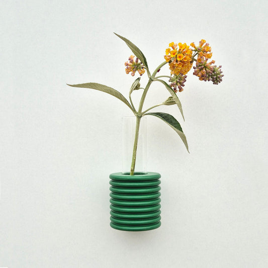 Modern Ribble wall-mounted ceramic vase in Green, handmade in Portugal. Space-saving vertical garden decor with Carbon-Neutral Shipping.