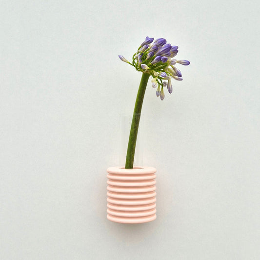 Modern Ribble wall-mounted ceramic vase in Pink, handmade in Portugal. Space-saving vertical garden decor with Carbon-Neutral Shipping.