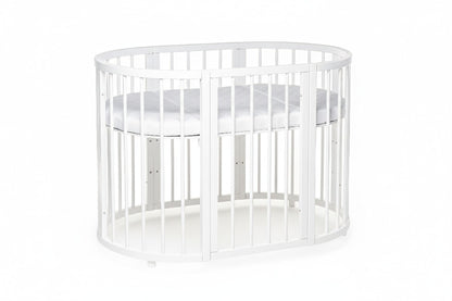 Modern oval baby cot placed in a stylish and minimalist nursery room - level 3 -