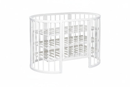 KOTTO Olin space-saving round baby crib in a clean white finish - Levels -