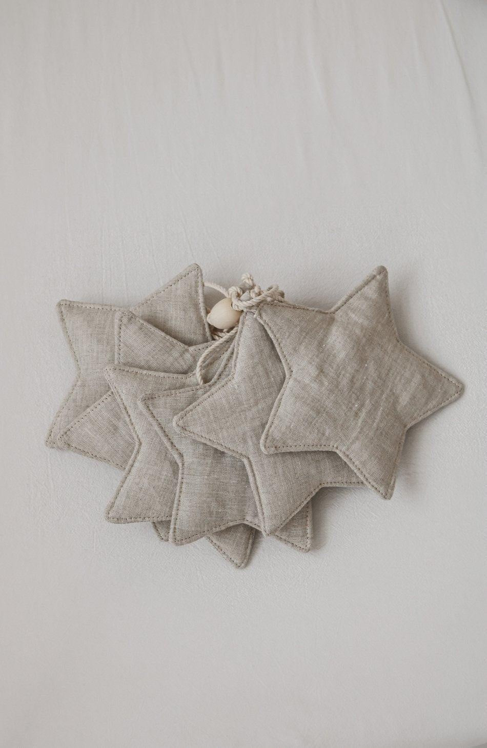 Top View Moi Mili Sand Star Dust Star Garland - Warm beige hanging bunting with subtle shimmer