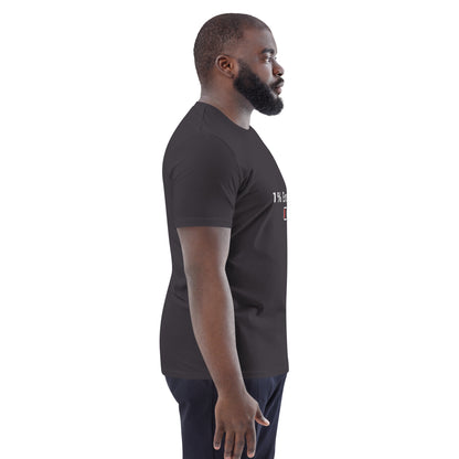 Side view of a male model wearing the 1% Energy vegan tee. antharacite
