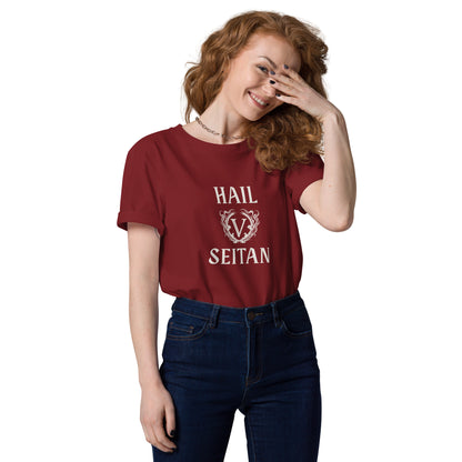 Female model modeling a burgundy Hail Seitan vegan streetwear tee featuring a vintage ivory gothic emblem.