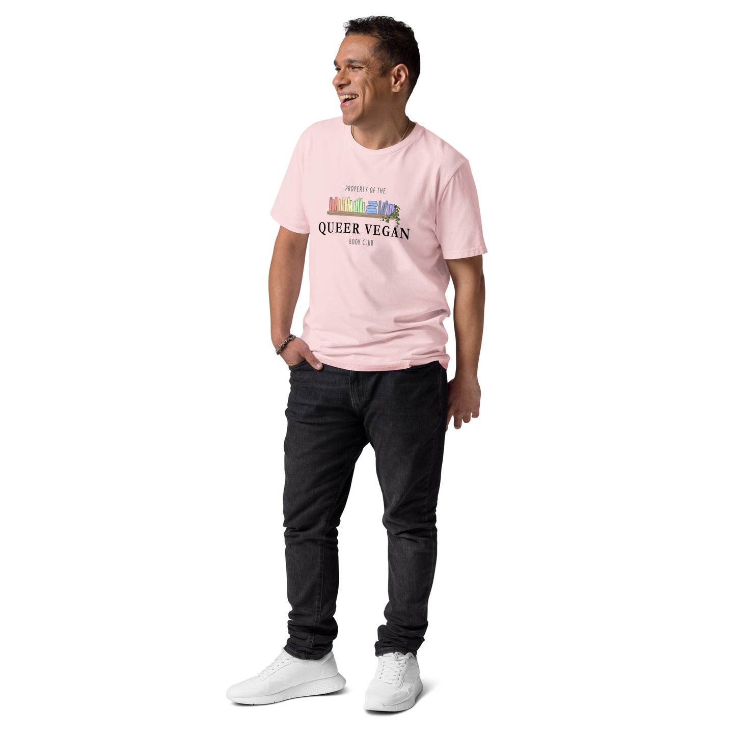 Male model wearing a pink organic cotton t-shirt highlighting the queer vegan bookish graphic.