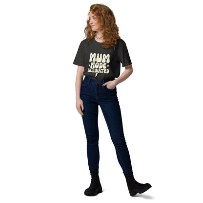 Entire view A woman casually modeling the vintage style dark grey heather t-shirt with the MUM MODE ACTIVATED graphic."
