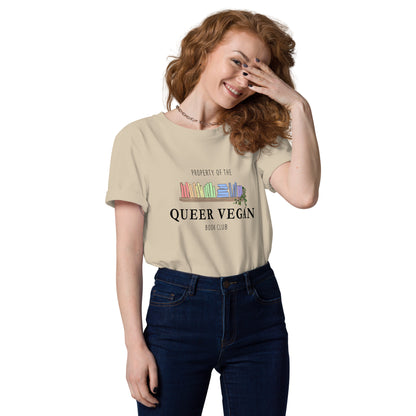 Female model wearing a desert dust 'Property of the Queer Vegan Book Club' sustainable t-shirt.