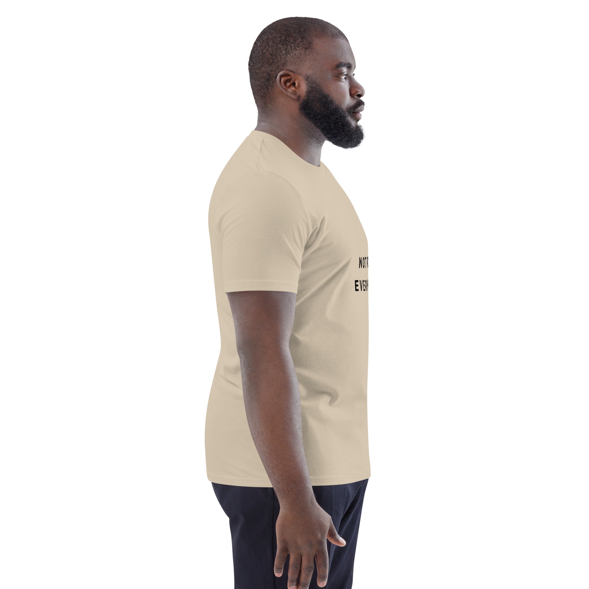 Side view of a male model wearing the vegan Not for Everyone tee. dust