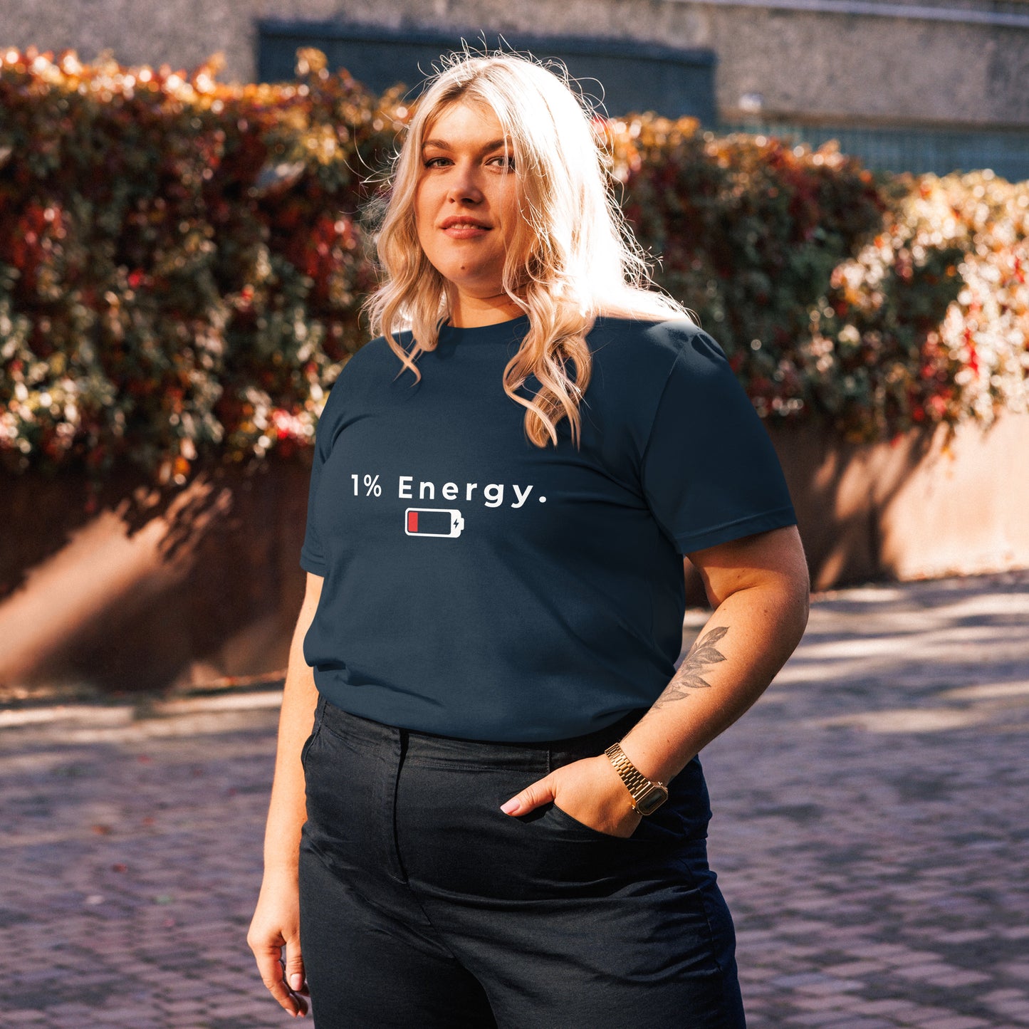 Female model wearing the 1% Energy organic cotton t-shirt, front view. navy