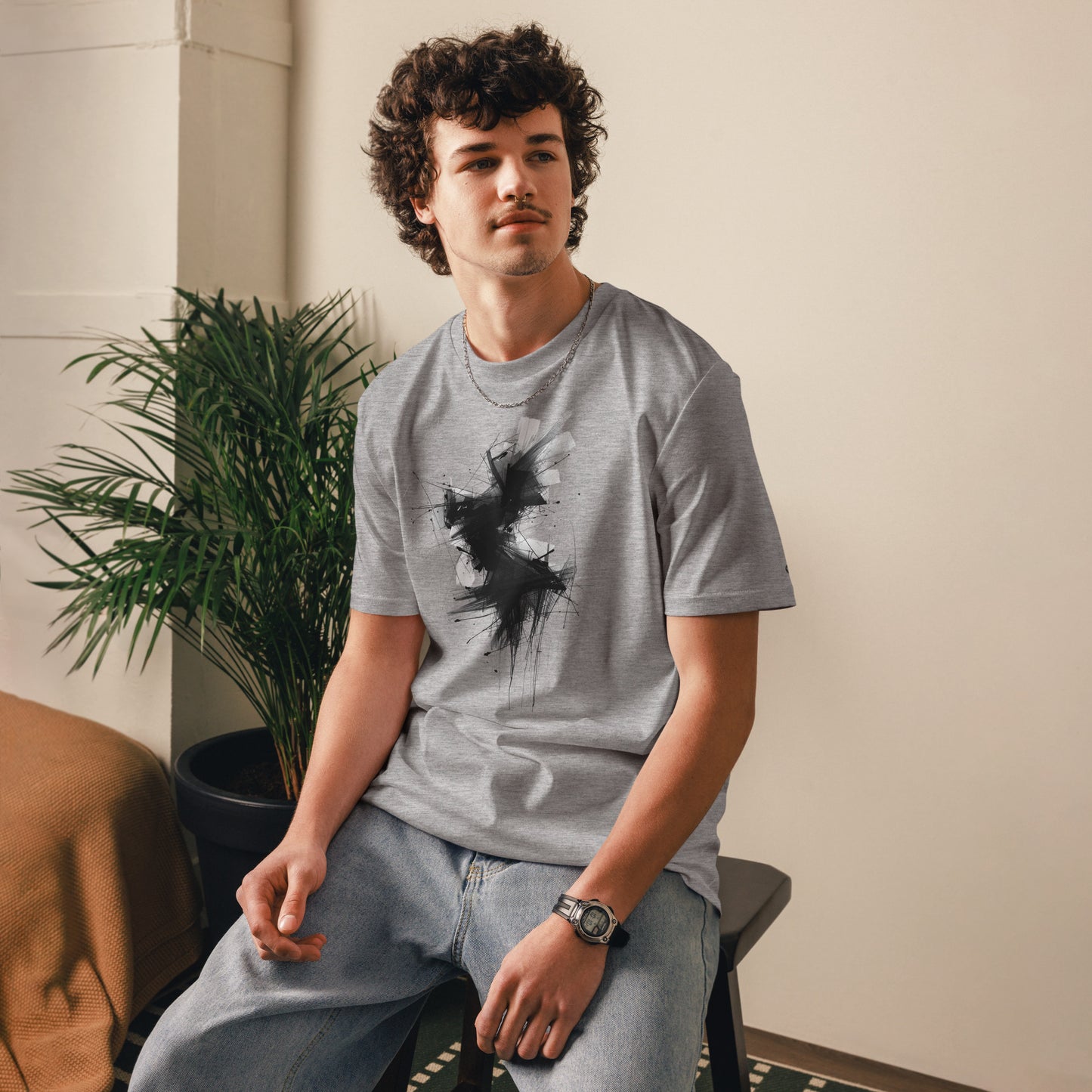 Male model lifestyle wearing the Phantom Spirit organic cotton t-shirt, front view. grey