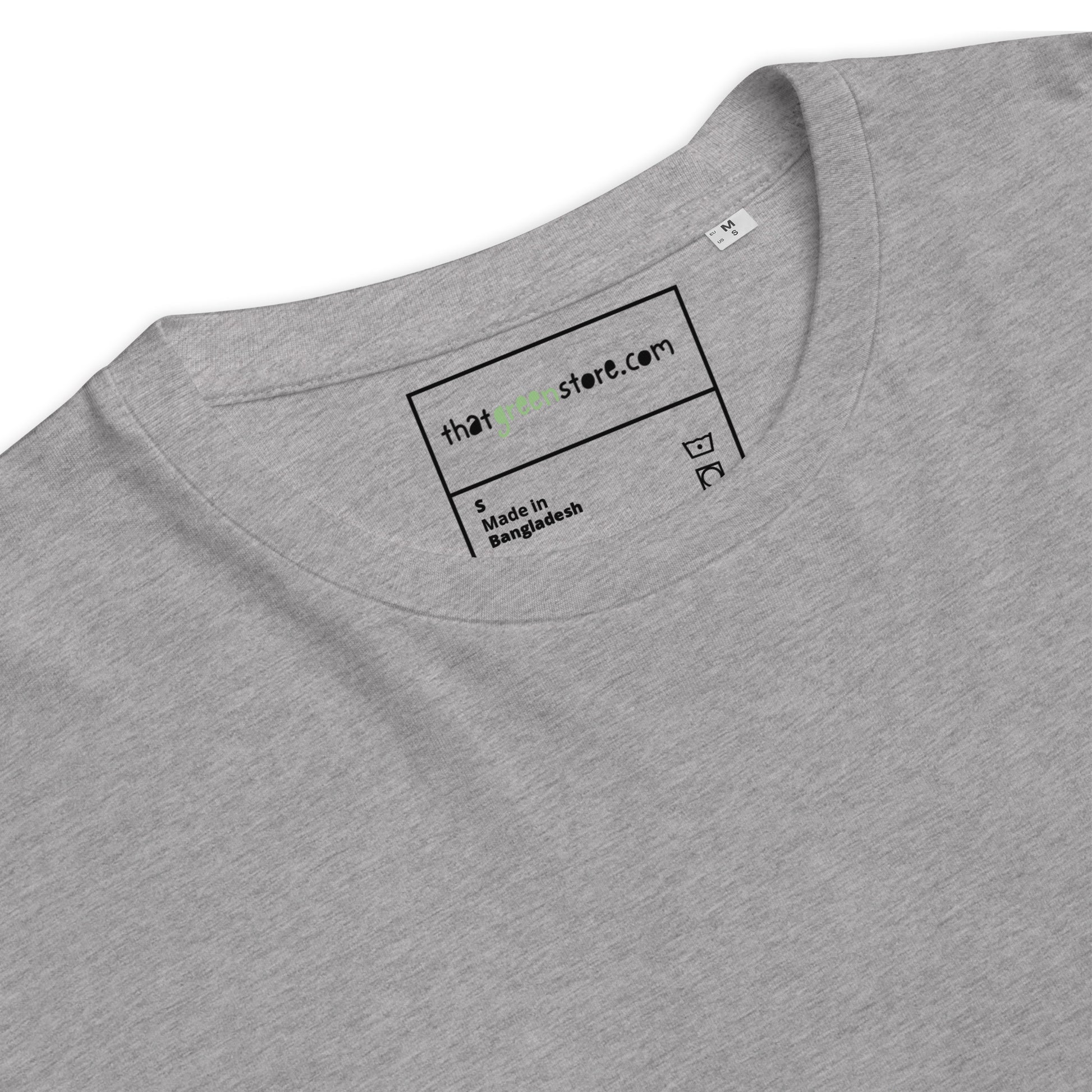 Close-up detail of the custom printed inner neck label on the "raising humans on plants." t-shirt, highlighting the 180g premium organic cotton fabric. -grey-