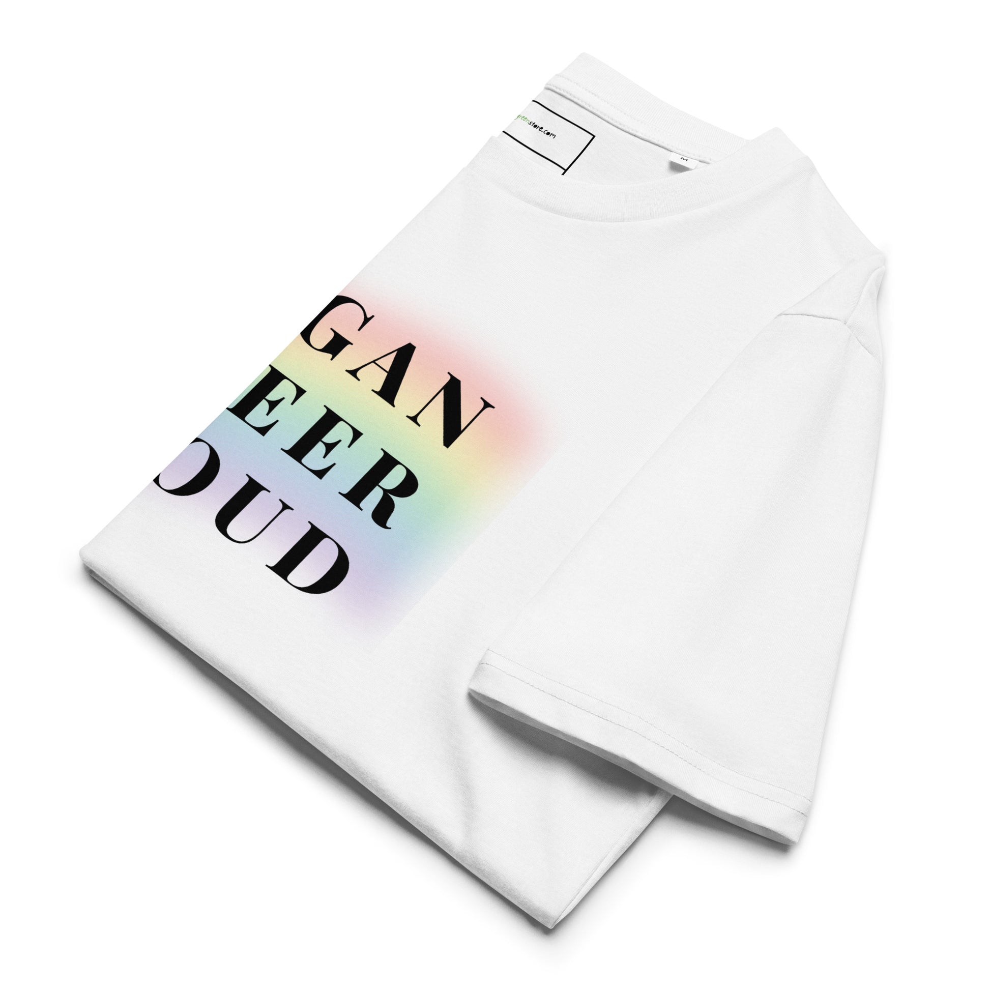Neatly folded "Vegan queer proud" organic ring-spun cotton t-shirt, displaying the soft fabric texture.